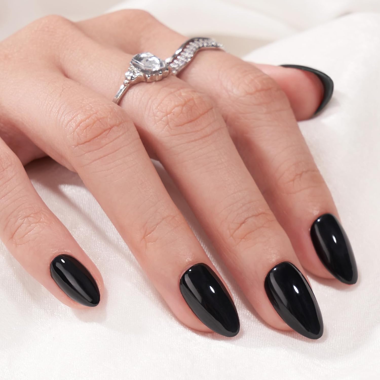 Black Almond short press-on nails in Black Velvet soft gel